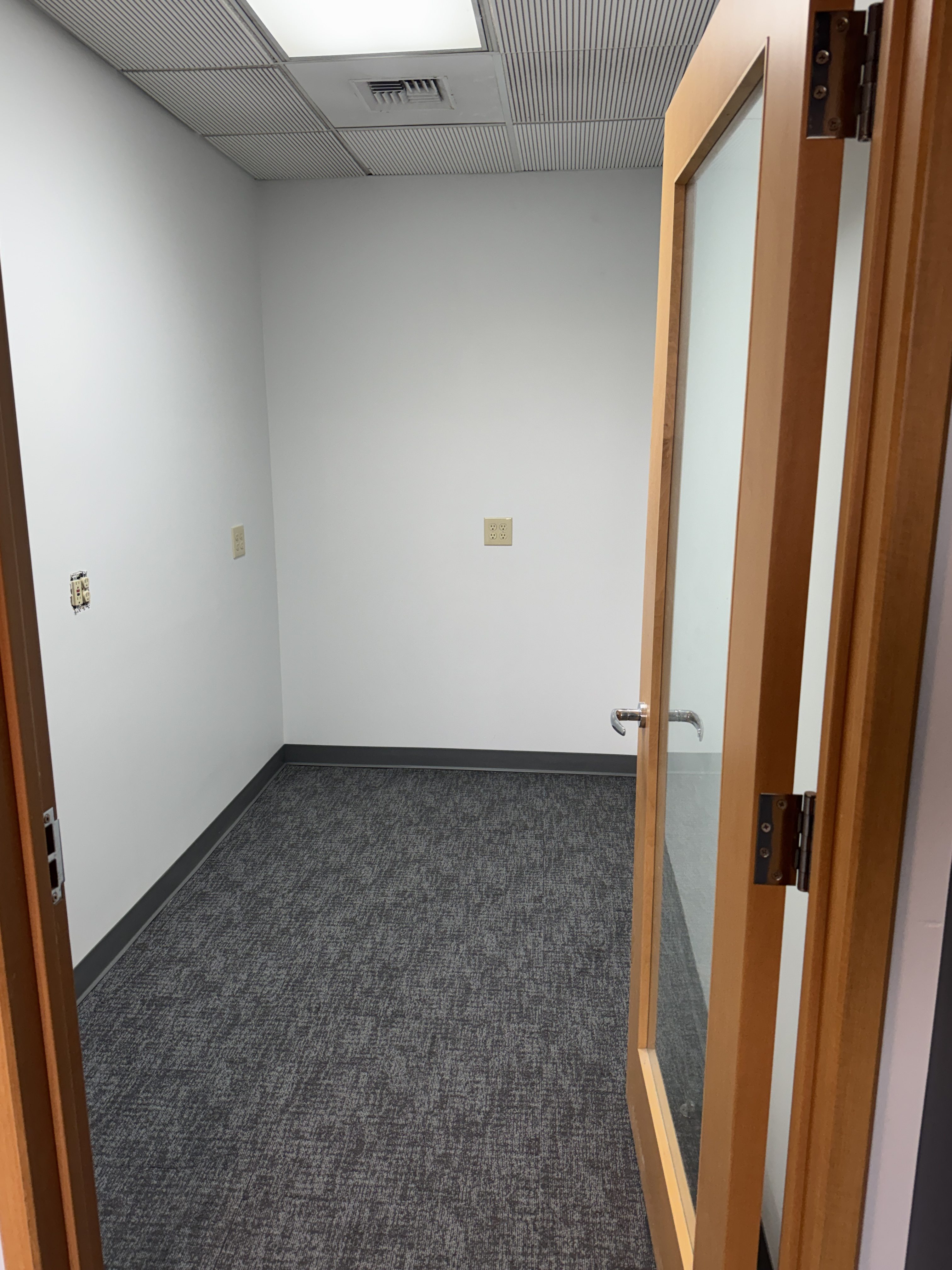 Abandoned data and electrical wiring removed from ceiling during office build-out demolition