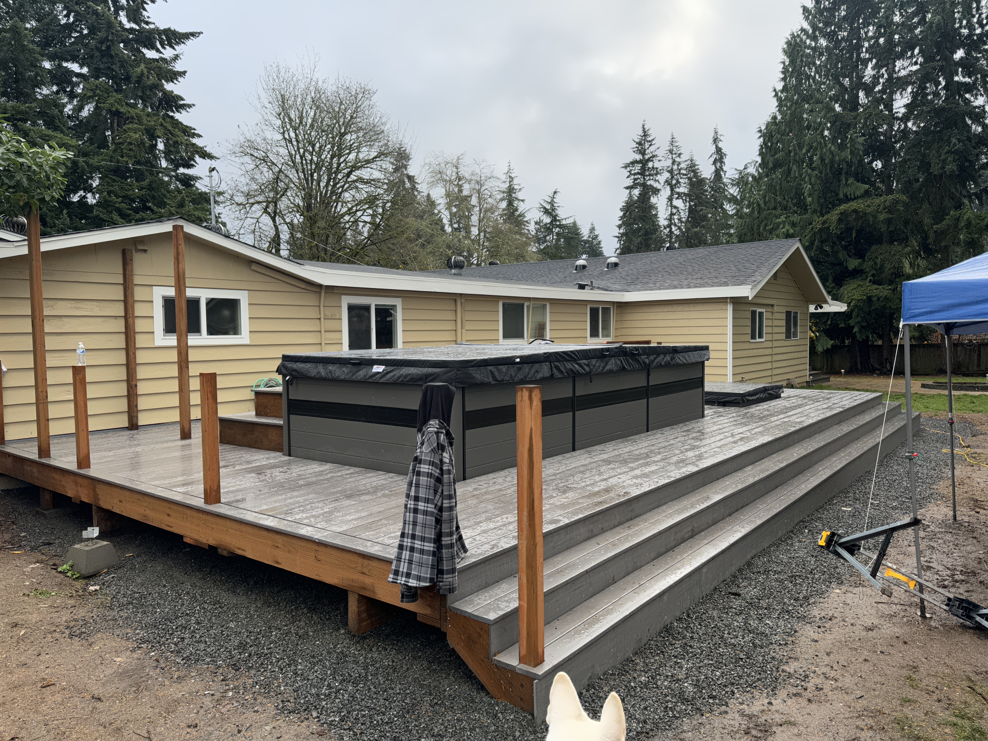Infinity swim spa and hot tub cold plunge set into the new composite deck with cedar railing posts in Kenmore WA