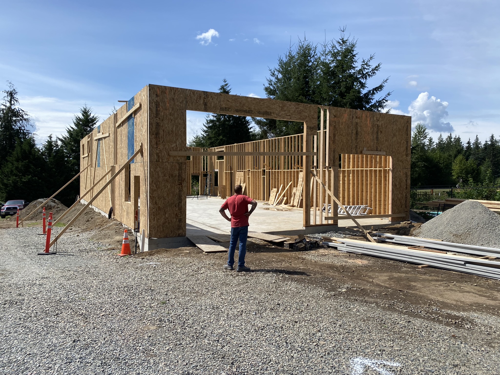Wall framing and oversized door opening on the Monroe commercial shop new build