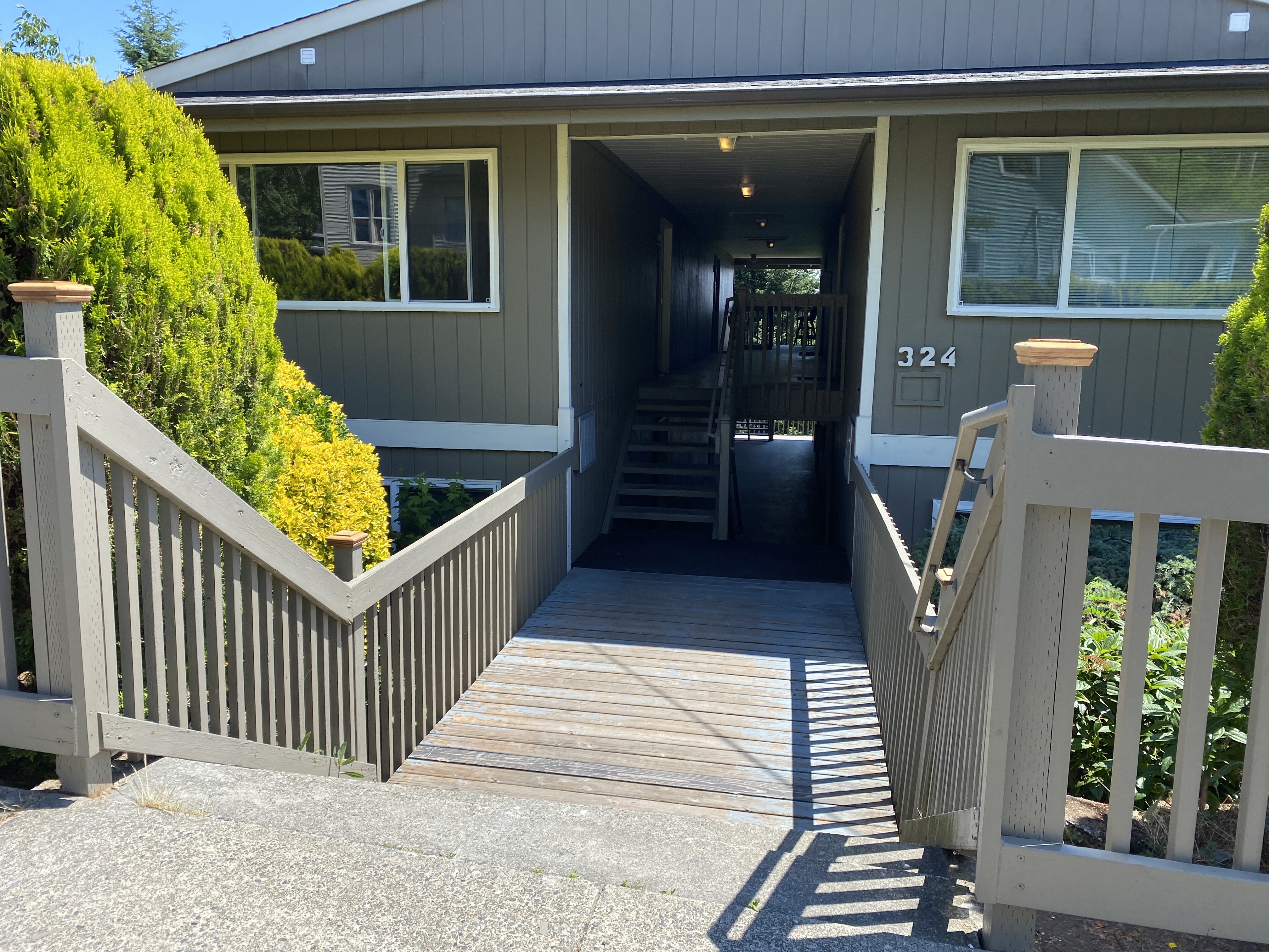 Refreshed entry breezeway of a six-unit multiplex in Juanita Hills, Kirkland